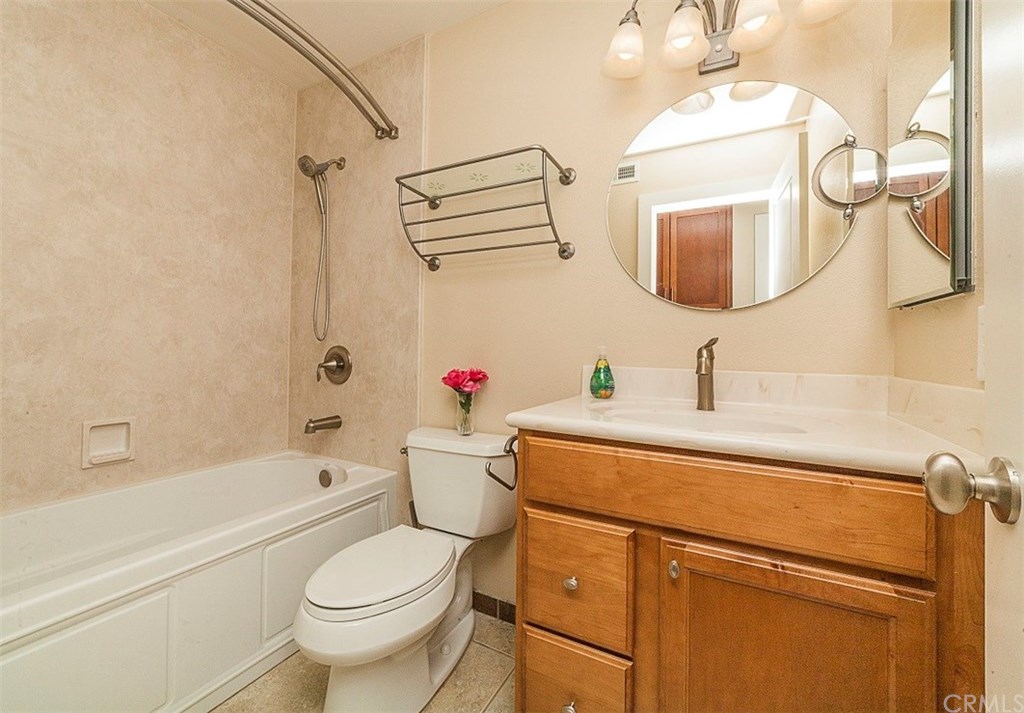 8 Hawthorn Irvine, CA 92612 - Photo 20 of 27 a bathroom with a sink a toilet and shower