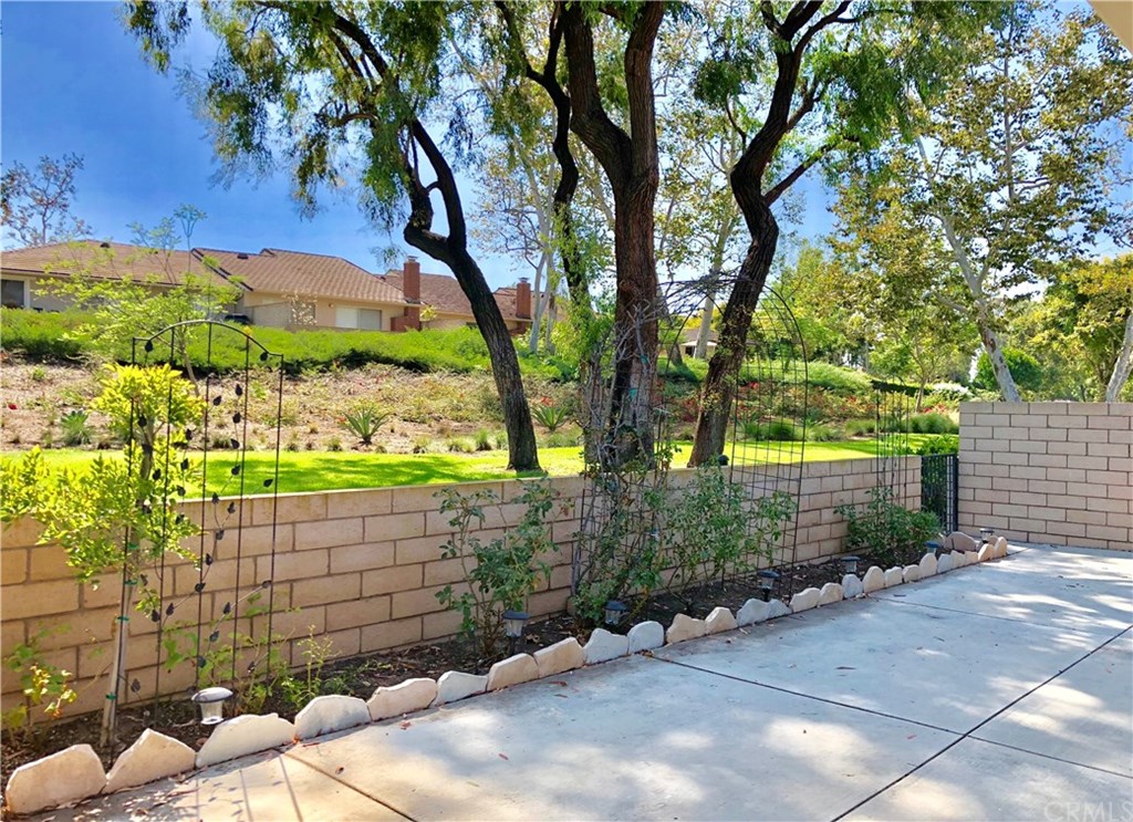 8 Hawthorn Irvine, CA 92612 - Photo 24 of 27 a view of a pathway with a wrought fence