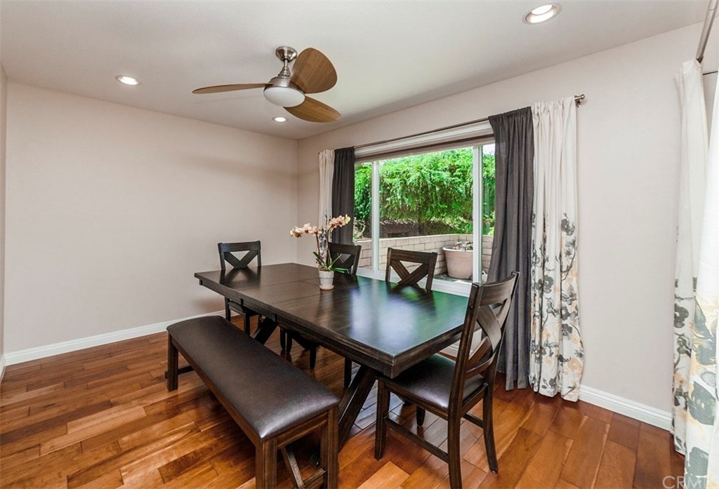 8 Hawthorn Irvine, CA 92612 - Photo 6 of 27 a view of a dining room with furniture window and wooden floor