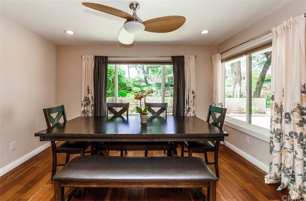 8 Hawthorn Irvine, CA 92612 - Photo 7 of 27 a view of a dining room with furniture window and wooden floor