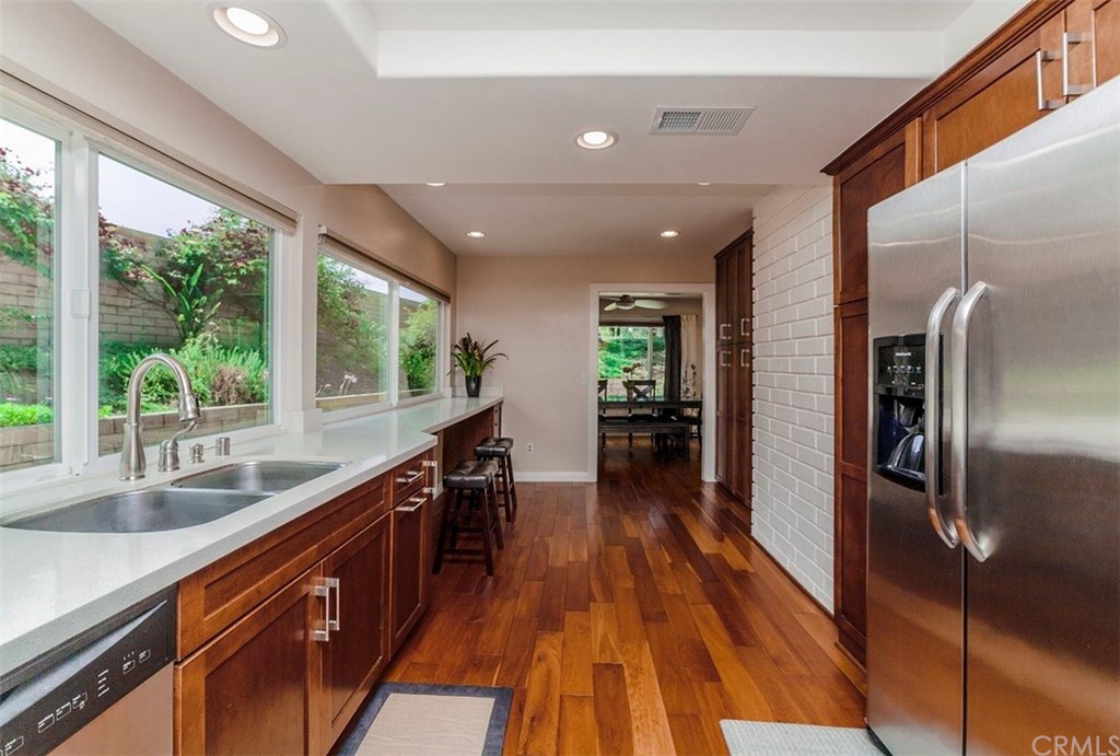 8 Hawthorn Irvine, CA 92612 - Photo 10 of 27 a view of a kitchen with a large window