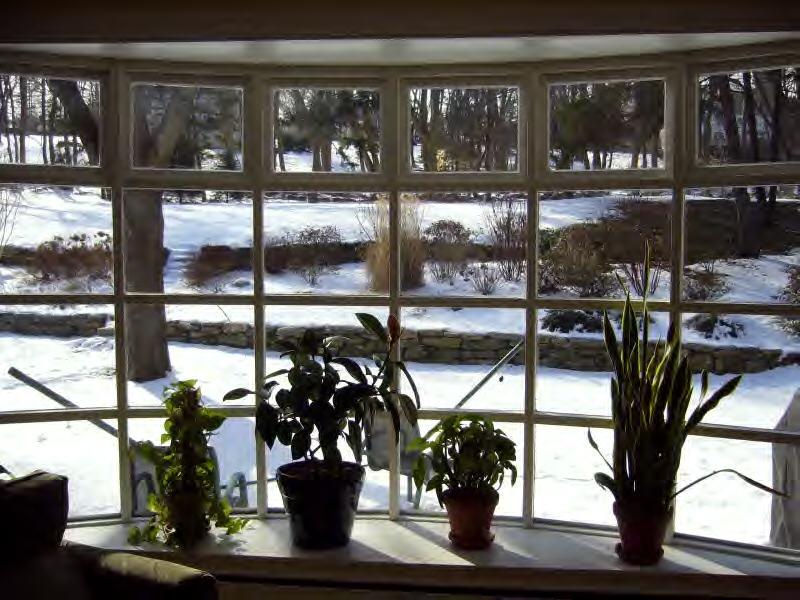 Undisclosed Address New Canaan, CT 06840 - Photo 5 of 14 a view of a porch with a potted plant