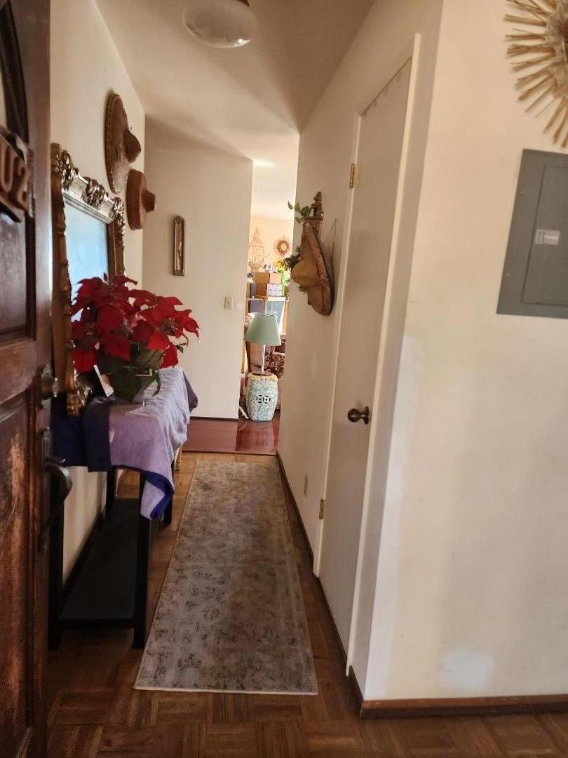 70 Overpass Road Watsonville, CA 95076 - Photo 11 of 29 a living room with furniture and a wooden floor