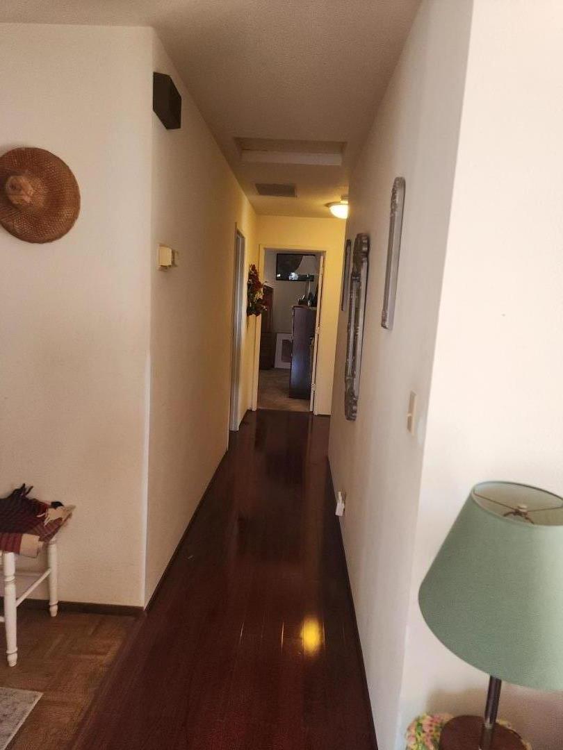70 Overpass Road Watsonville, CA 95076 - Photo 19 of 29 a view of a hallway with a dining room