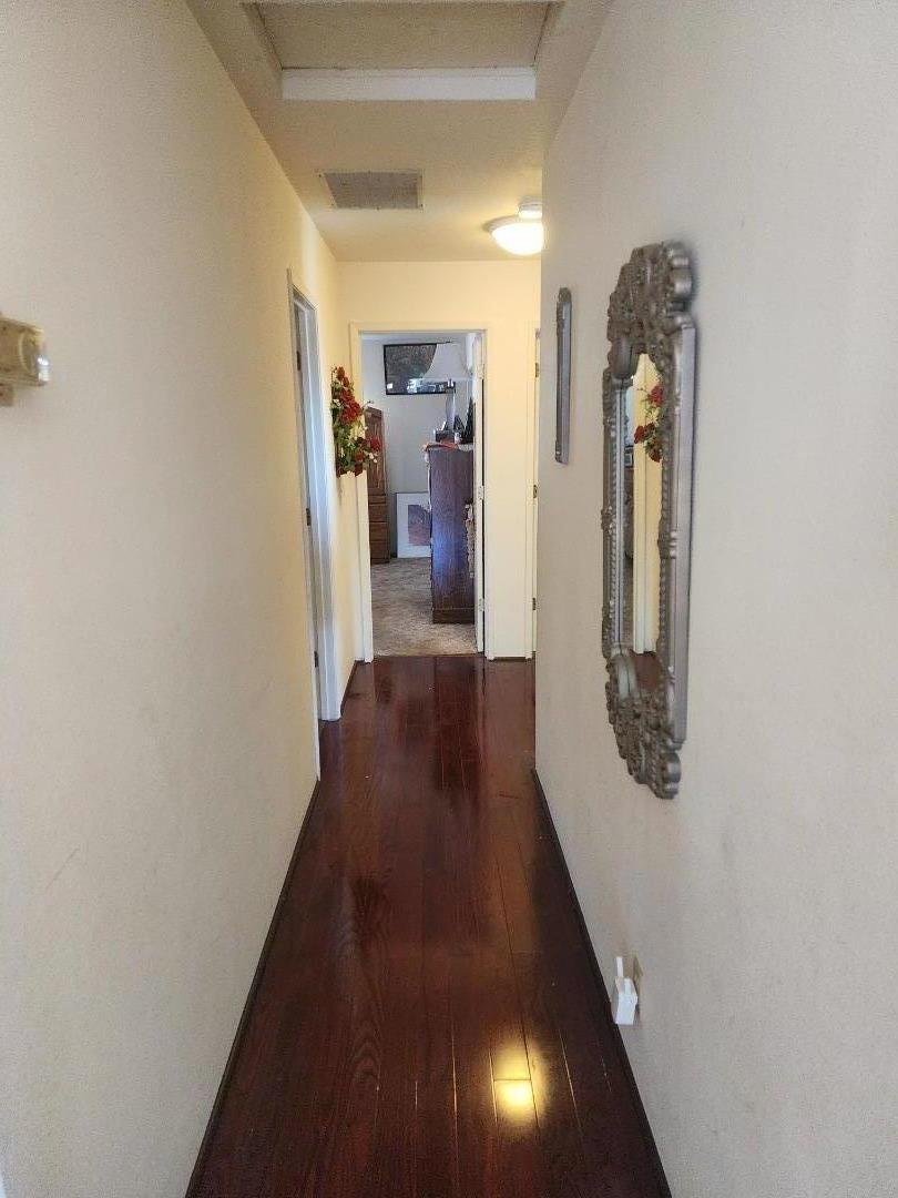 70 Overpass Road Watsonville, CA 95076 - Photo 20 of 29 a view of a hallway with wooden floor and stairs