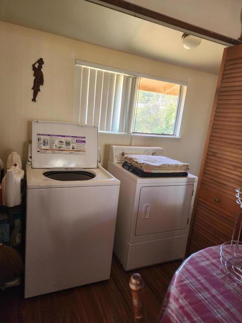 70 Overpass Road Watsonville, CA 95076 - Photo 26 of 29 a room with water heater and a wooden floor
