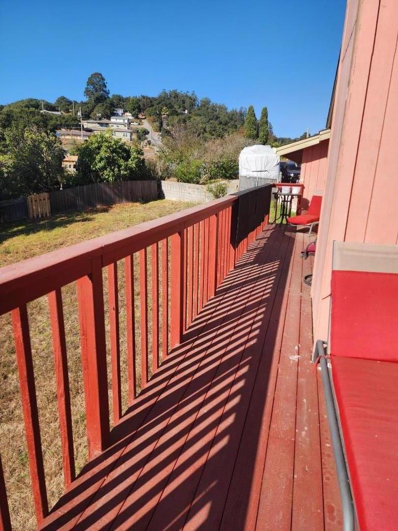 70 Overpass Road Watsonville, CA 95076 - Photo 6 of 29 a view of a balcony with wooden floor and outdoor space