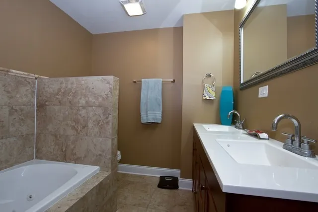 a bathroom with a sink and a bathtub