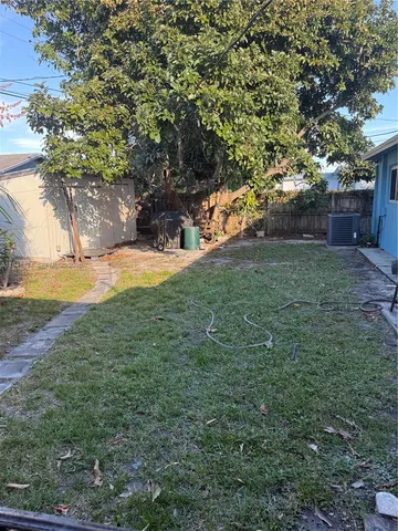 a view of yard with tree and green space