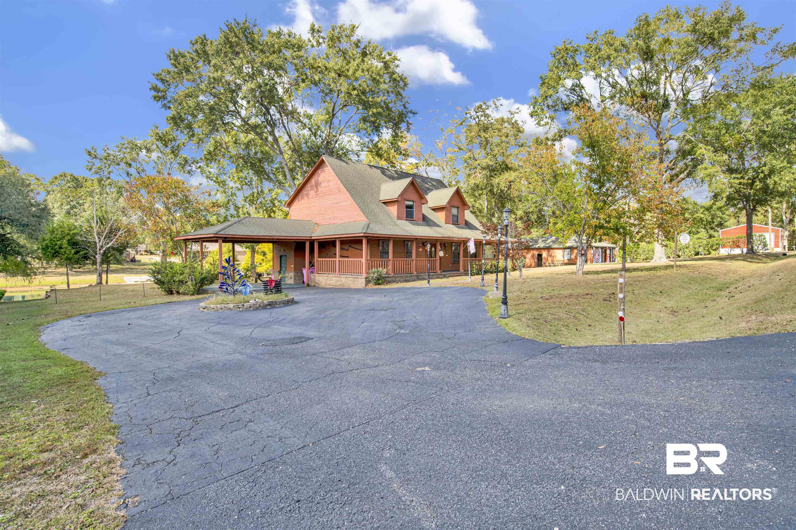 4890 Red Creek Road Semmes, AL 36575 - Photo 2 of 47 Farmhouse-style home with a front yard
