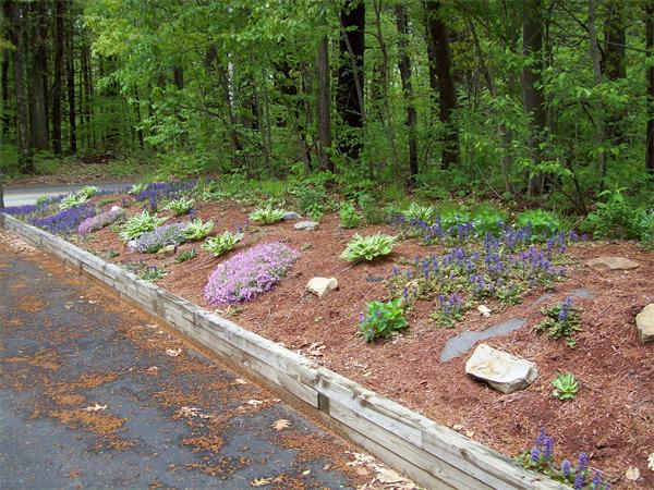 266 Ramshorn Road Dudley, MA 01571 - Photo 3 of 17 a view of a street with a bench
