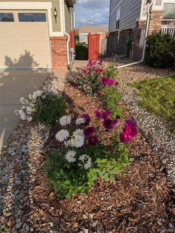 a house view with swimming pool and porch