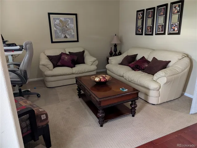 a living room with furniture and a couch