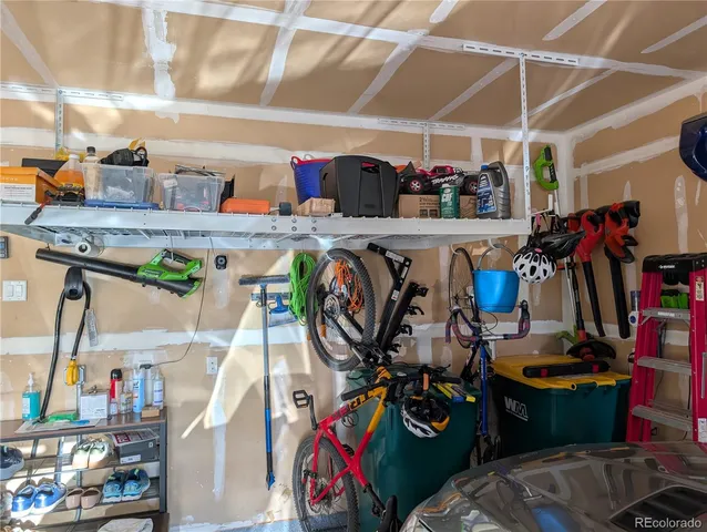 a bedroom with a bed and furniture