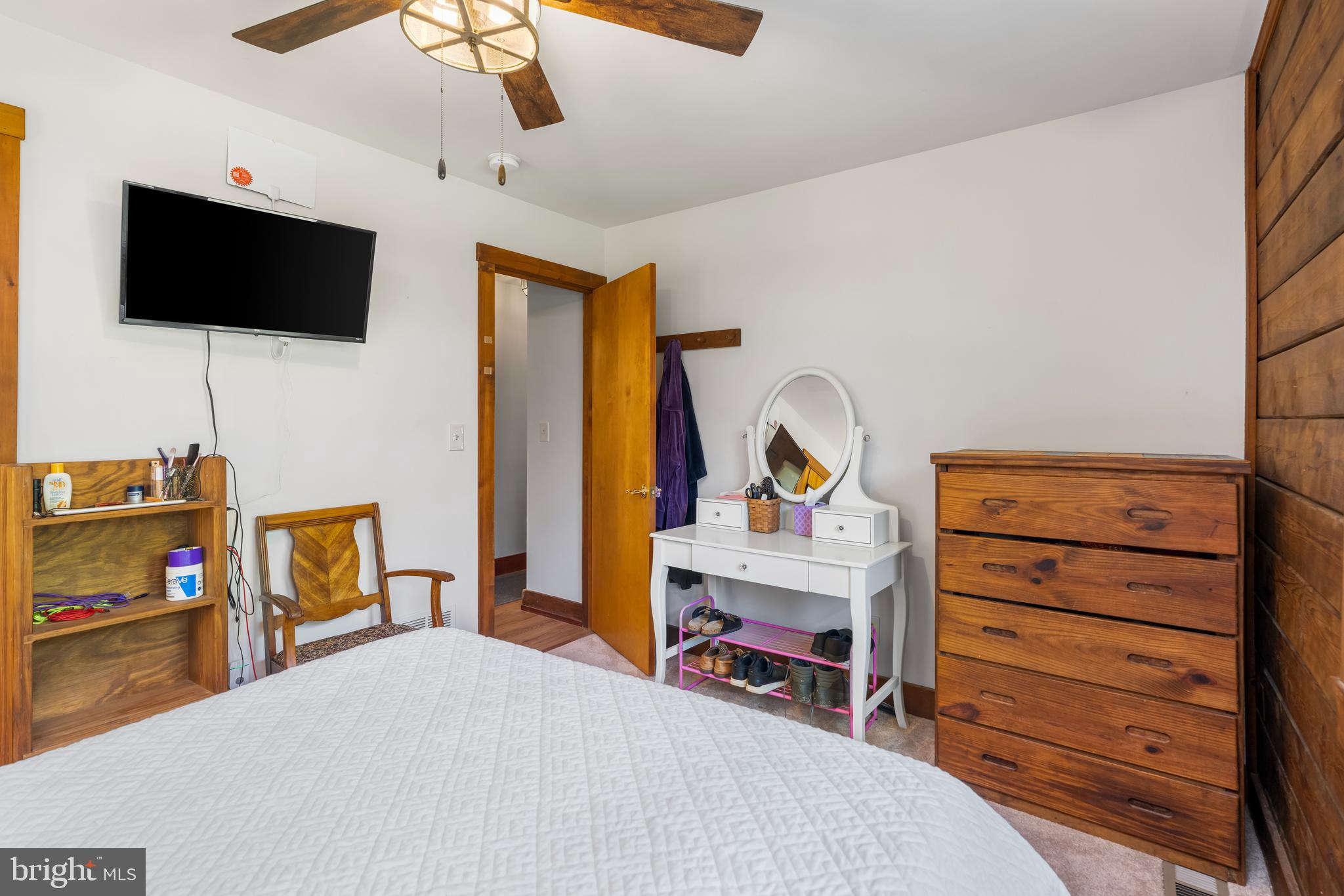 329 Everett Road Monkton, MD 21111 - Photo 18 of 41 a bedroom with a bed and a flat screen tv