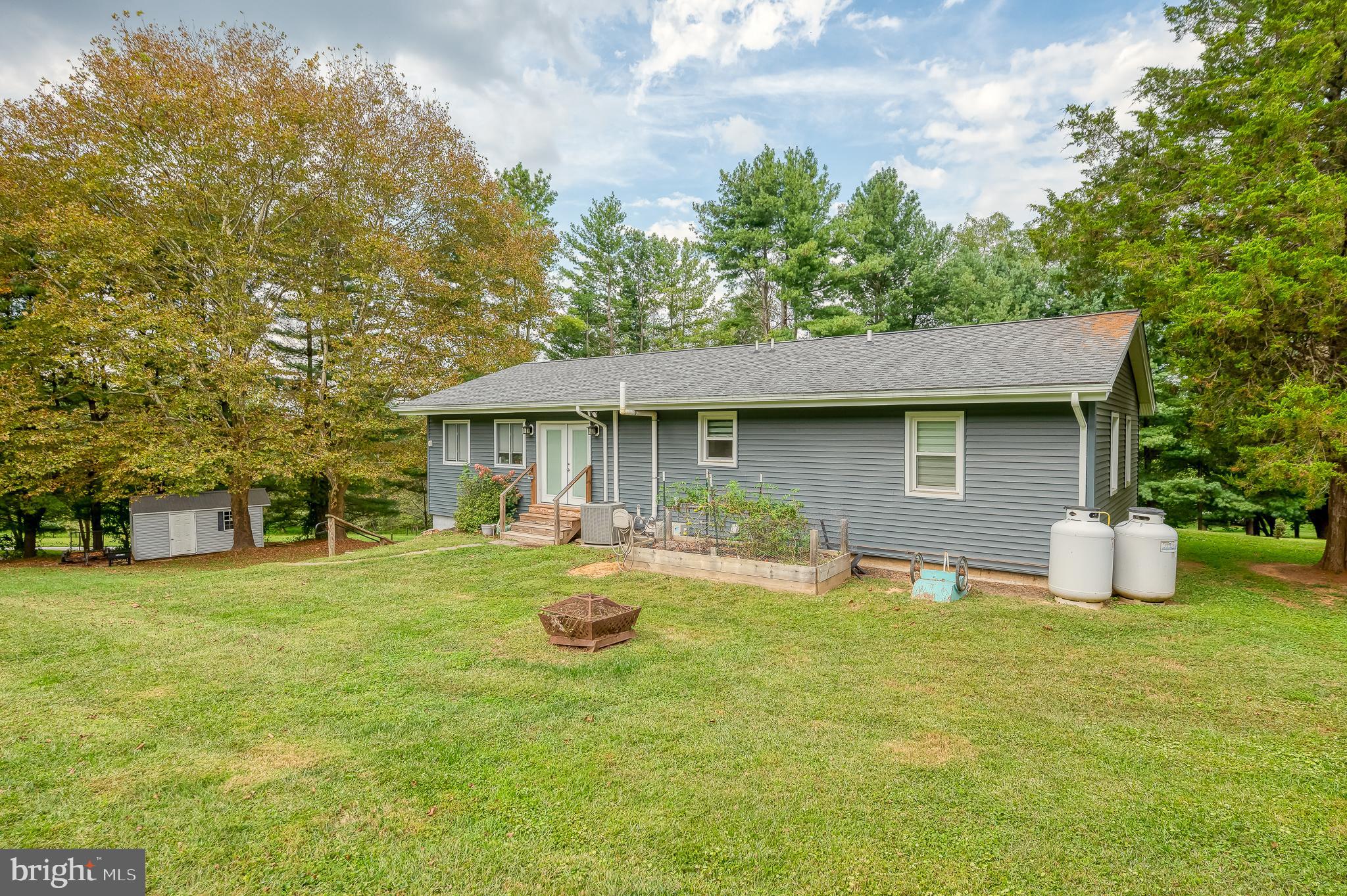 329 Everett Road Monkton, MD 21111 - Photo 32 of 41 a front view of house with yard and trees