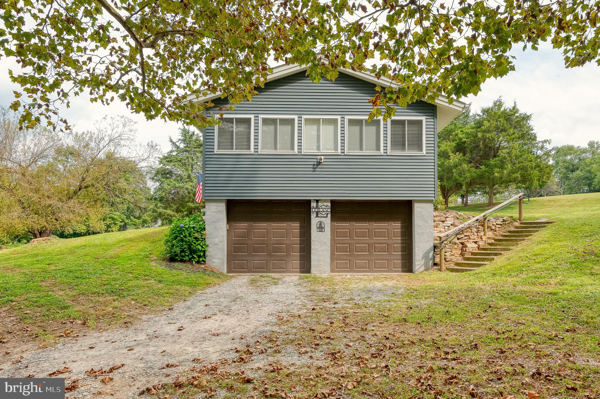 329 Everett Road Monkton, MD 21111 - Photo 34 of 41 a front view of a house with a garden