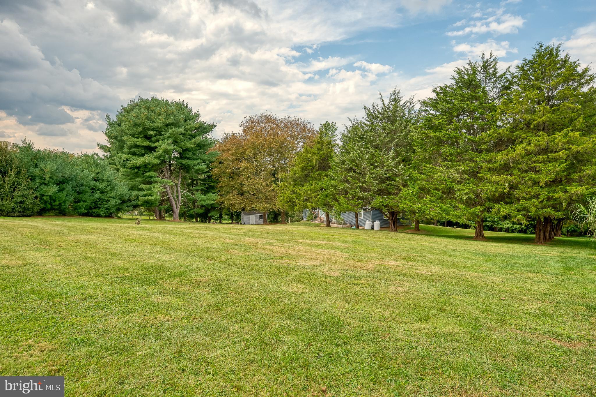 329 Everett Road Monkton, MD 21111 - Photo 36 of 41 a view of a field with trees in the background