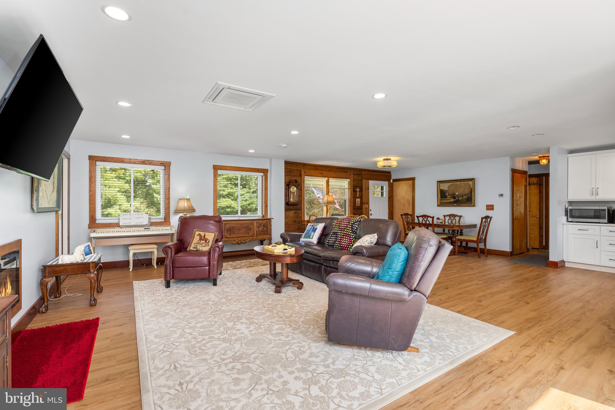 329 Everett Road Monkton, MD 21111 - Photo 7 of 41 a living room with furniture and a flat screen tv