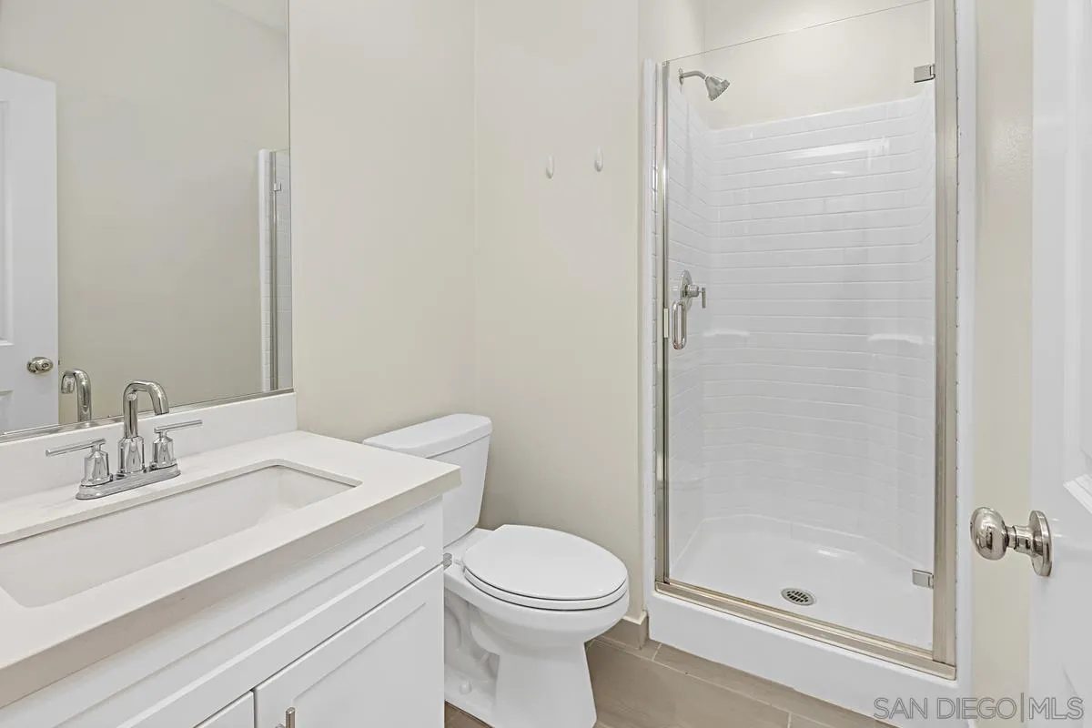 340 Millstream Court Santee, CA 92071 - Photo 12 of 19 a bathroom with a sink a toilet and shower
