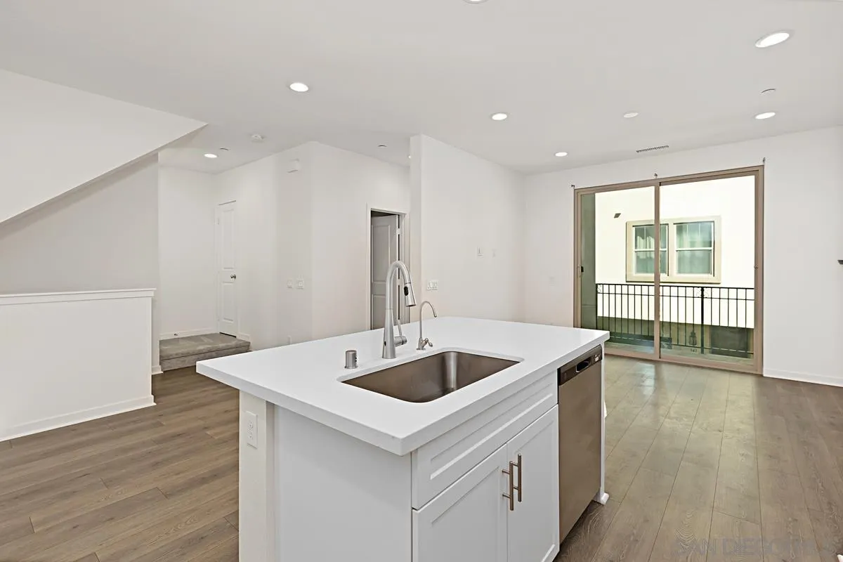 340 Millstream Court Santee, CA 92071 - Photo 9 of 19 a kitchen with a sink and large window