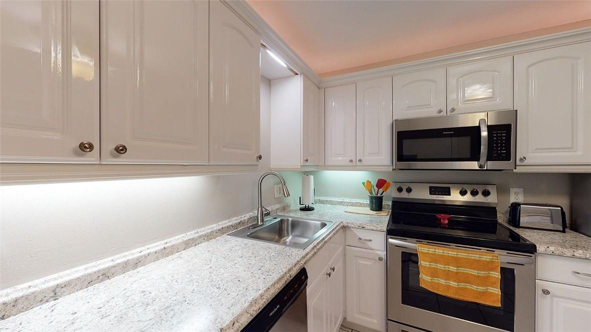 22615 Southwest 66th Avenue, Unit 211 Boca Raton, FL 33428 - Photo 3 of 27 updated kitchen with new countertops