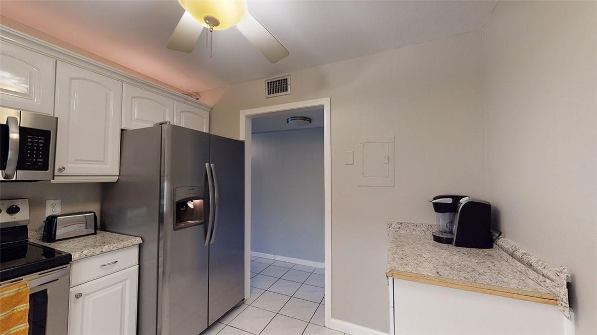 22615 Southwest 66th Avenue, Unit 211 Boca Raton, FL 33428 - Photo 4 of 27 updated kitchen with extra storage