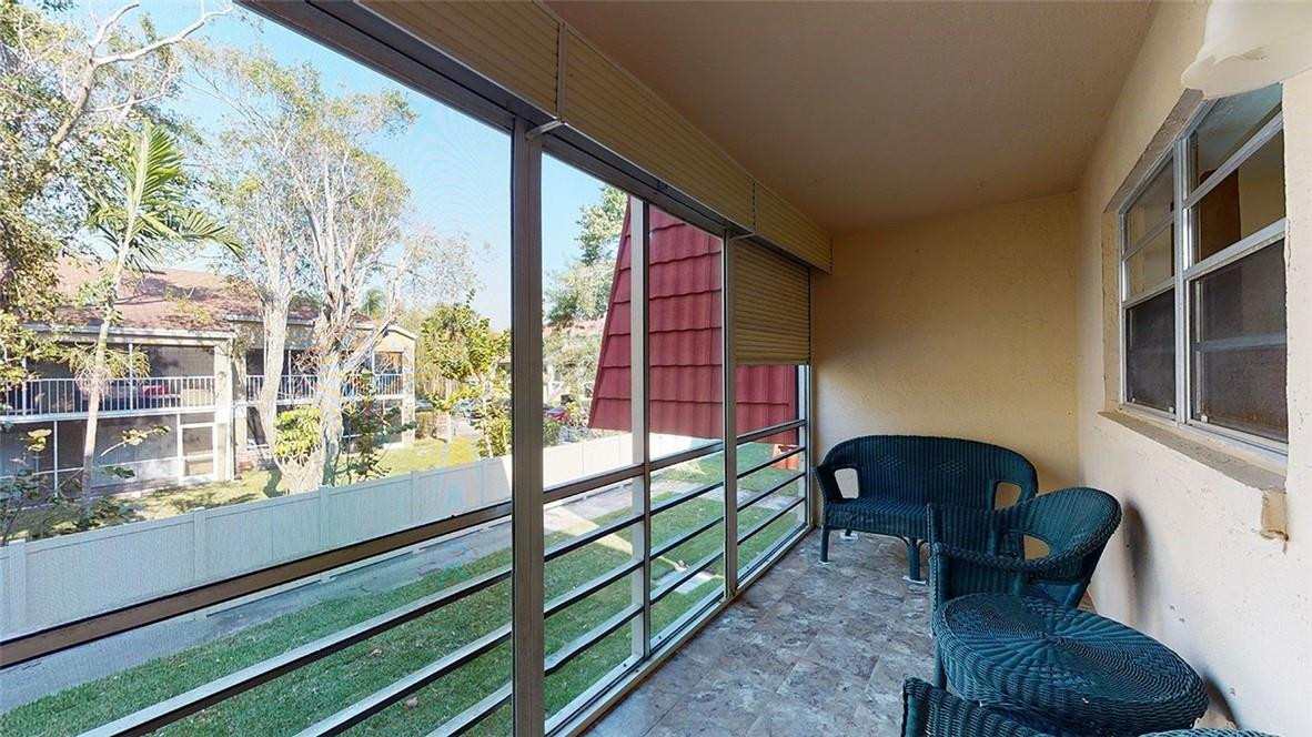 22615 Southwest 66th Avenue, Unit 211 Boca Raton, FL 33428 - Photo 9 of 27 private courtyard view
