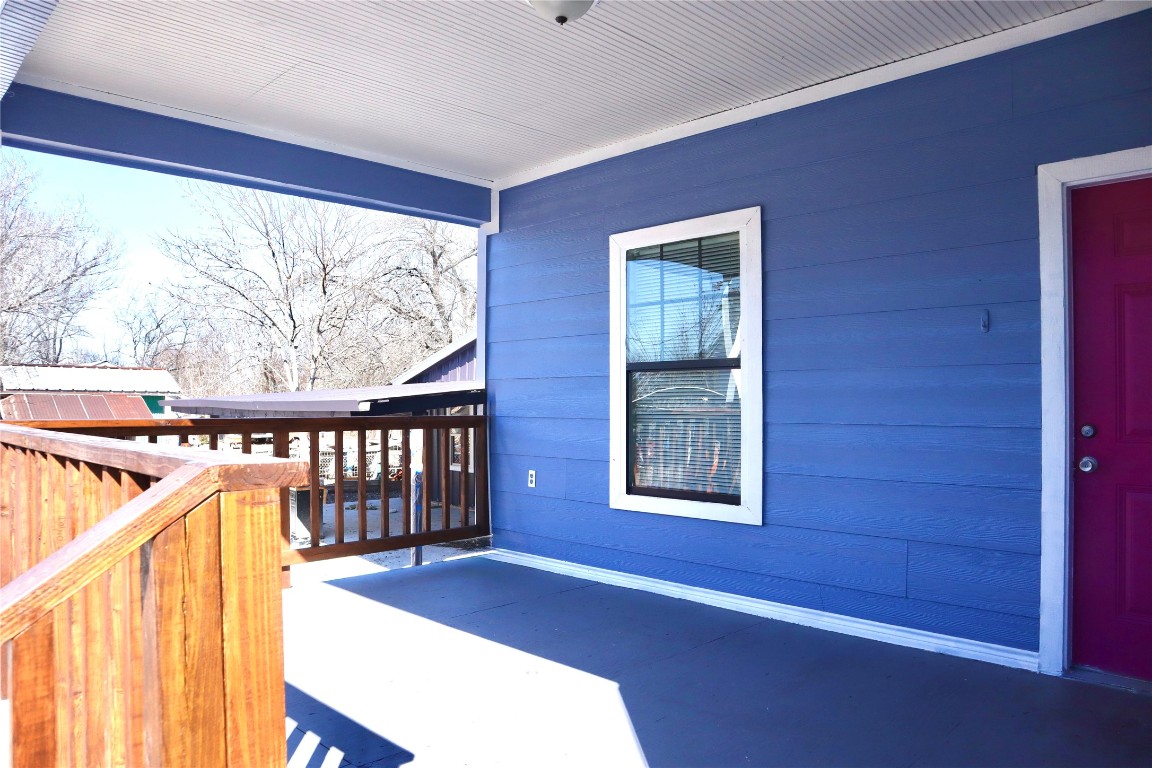 2689 County Road 32 Angleton, TX 77515 - Photo 3 of 15 Enjoy the outdoors year-round with a covered front patio, great for entertaining or unwinding.