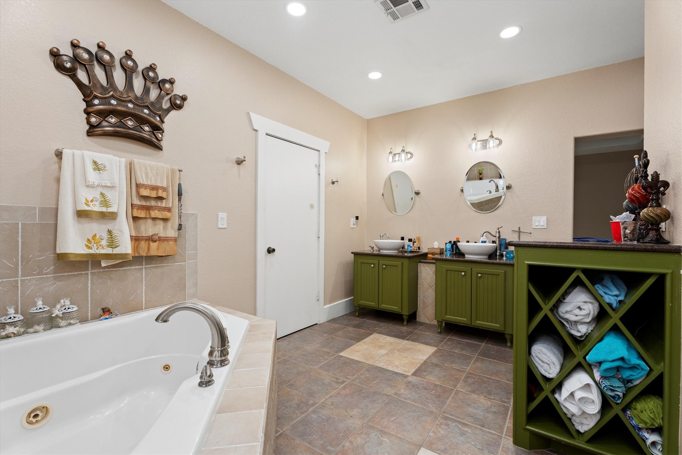 22924 Rio Grande Drive Porter, TX 77365 - Photo 14 of 19 a bathroom with a sink mirror and a bathtub
