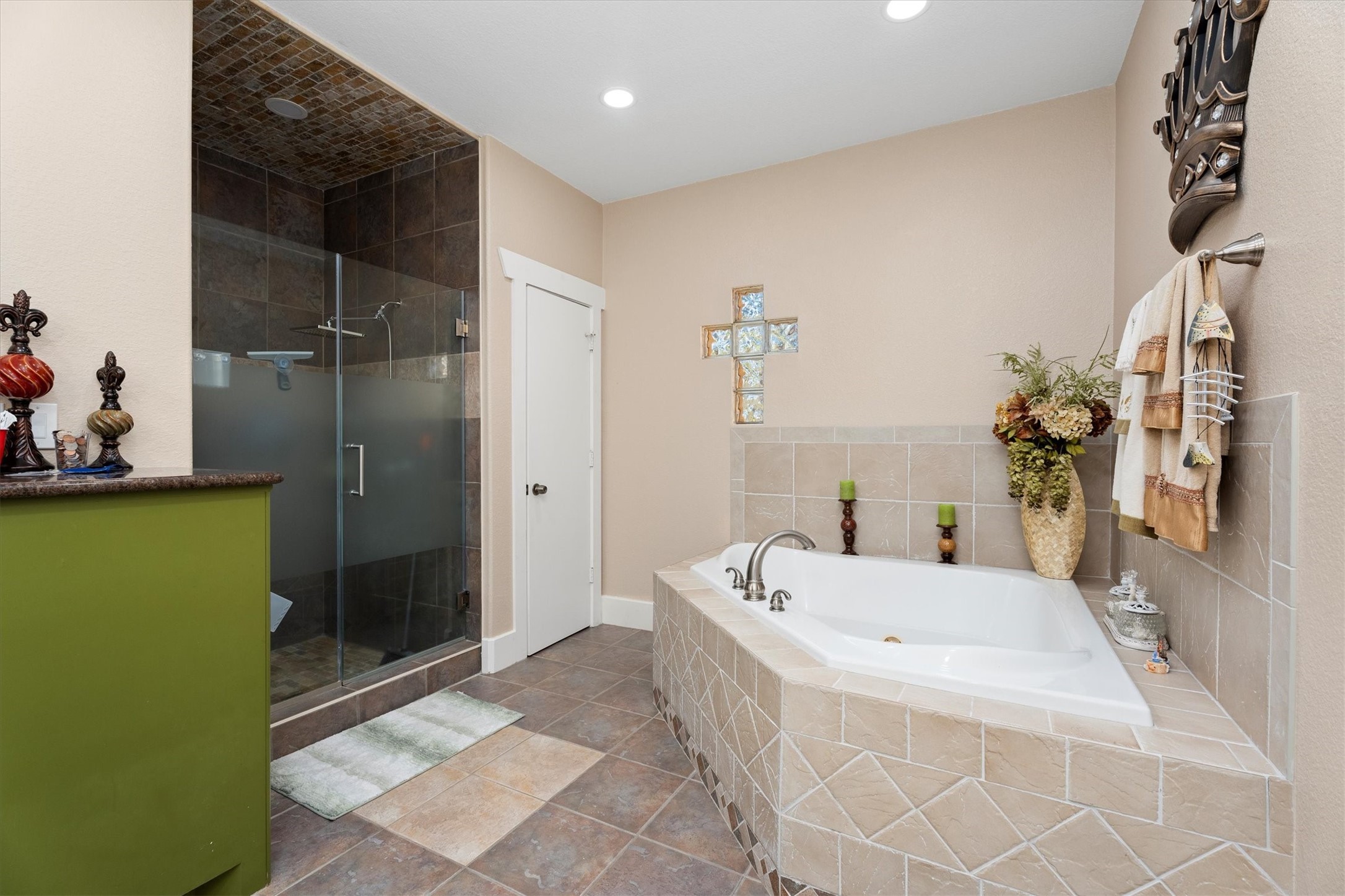 22924 Rio Grande Drive Porter, TX 77365 - Photo 15 of 19 a bathroom with a tub and a shower