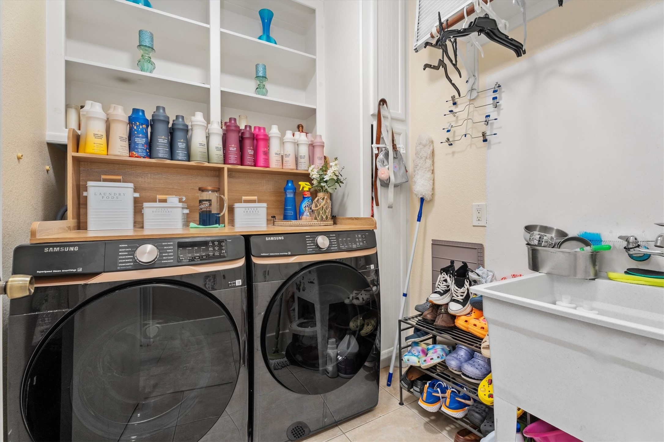 22924 Rio Grande Drive Porter, TX 77365 - Photo 16 of 19 a utility room with dryer and washer