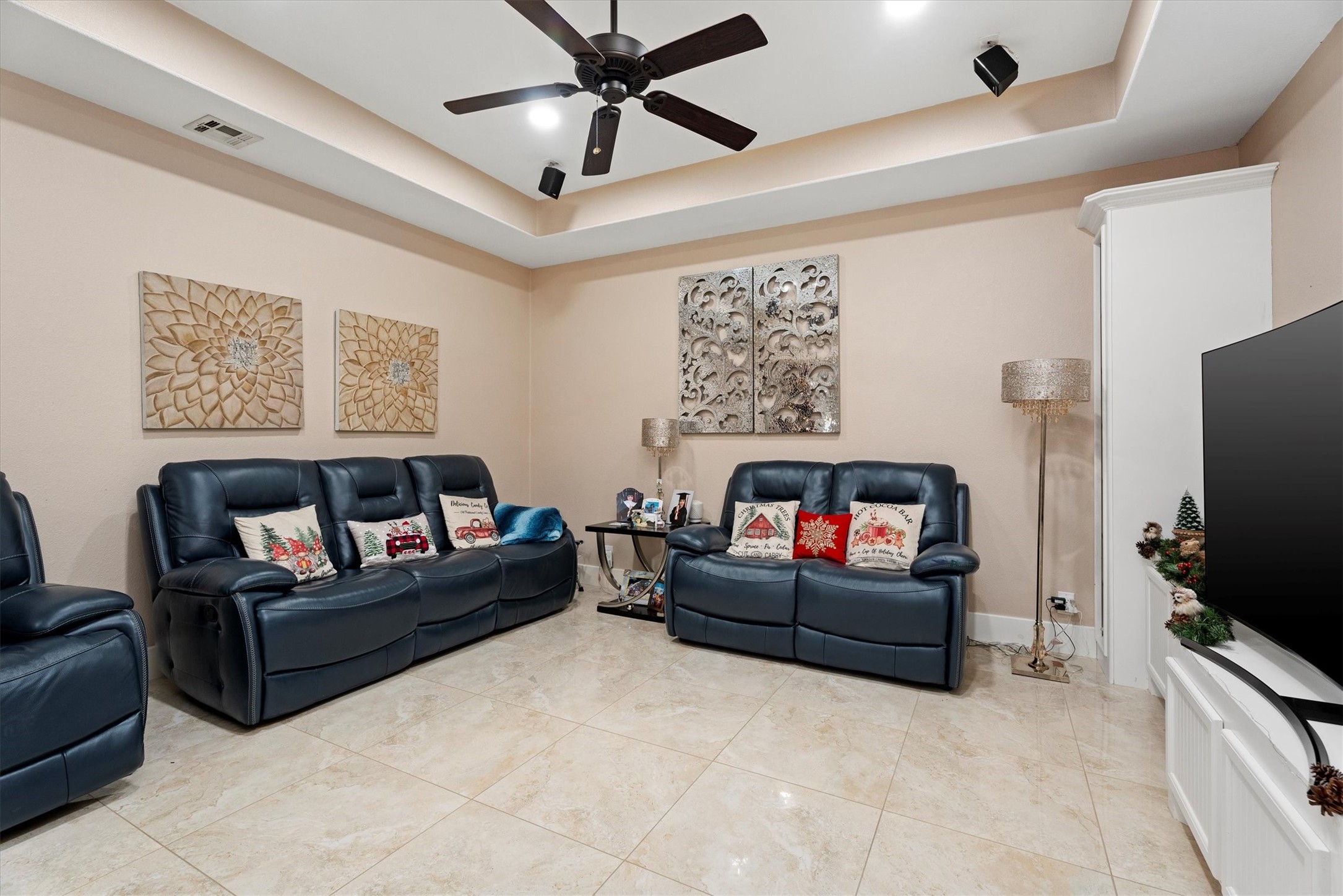 22924 Rio Grande Drive Porter, TX 77365 - Photo 19 of 19 a living room with furniture and a flat screen tv