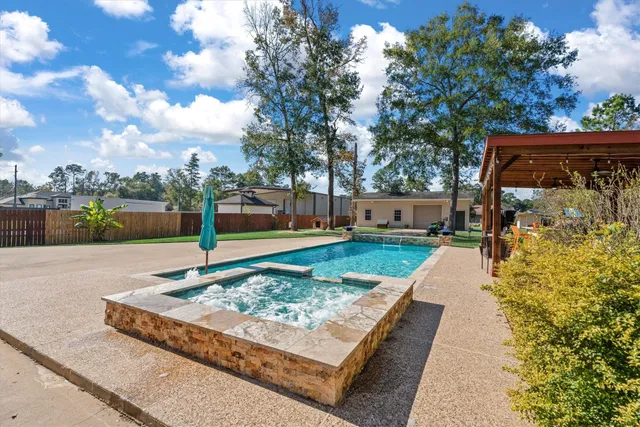 a view of a park with large trees