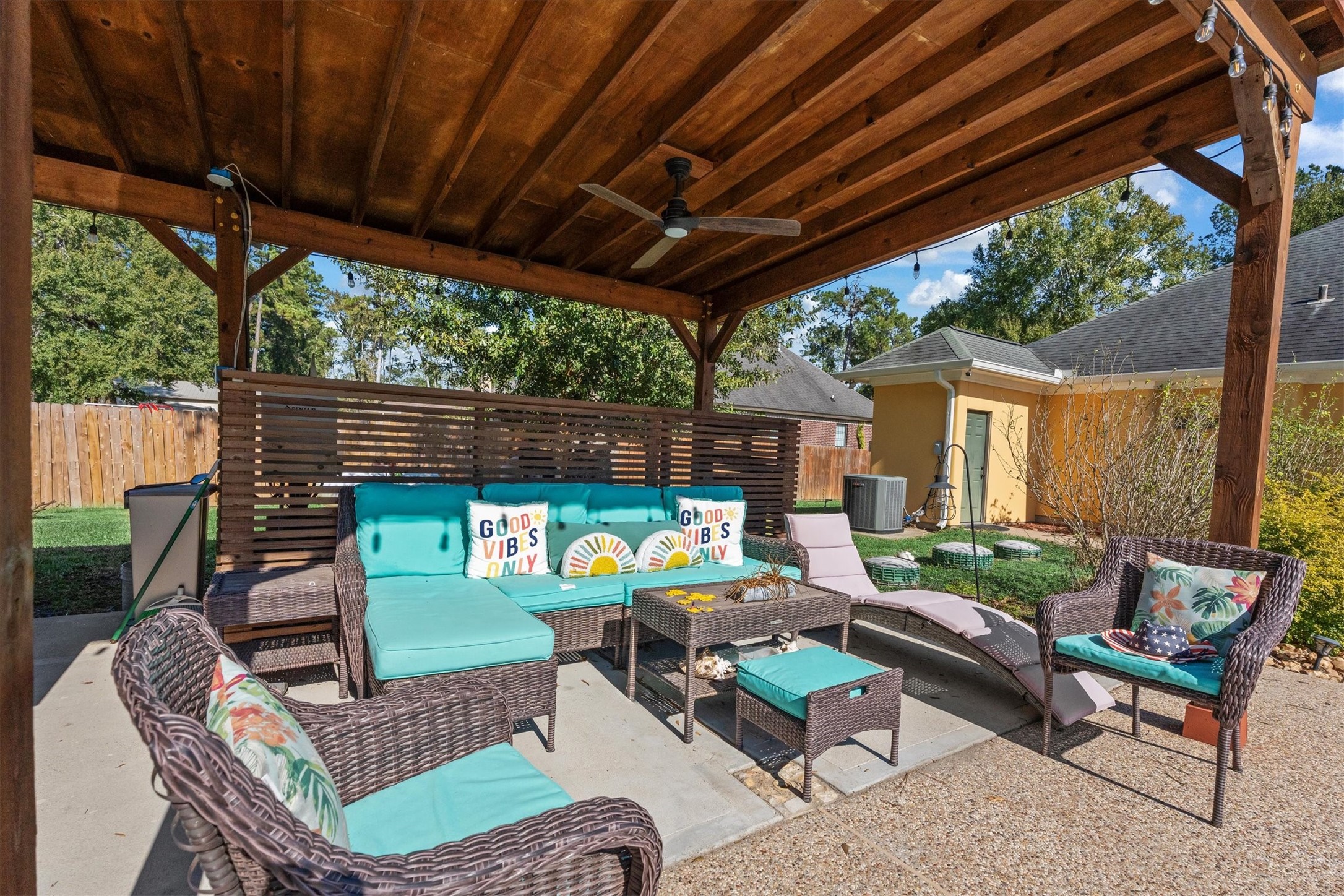 22924 Rio Grande Drive Porter, TX 77365 - Photo 7 of 19 a backyard of a house with outdoor seating