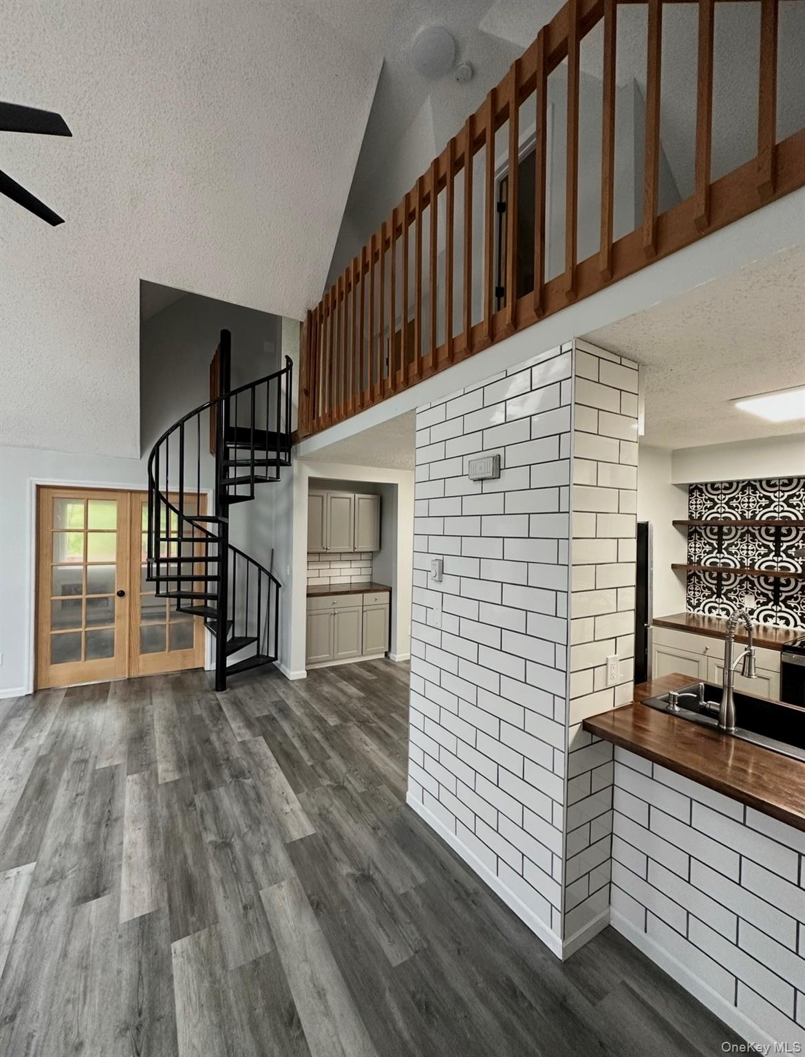 a view of front door with stairs