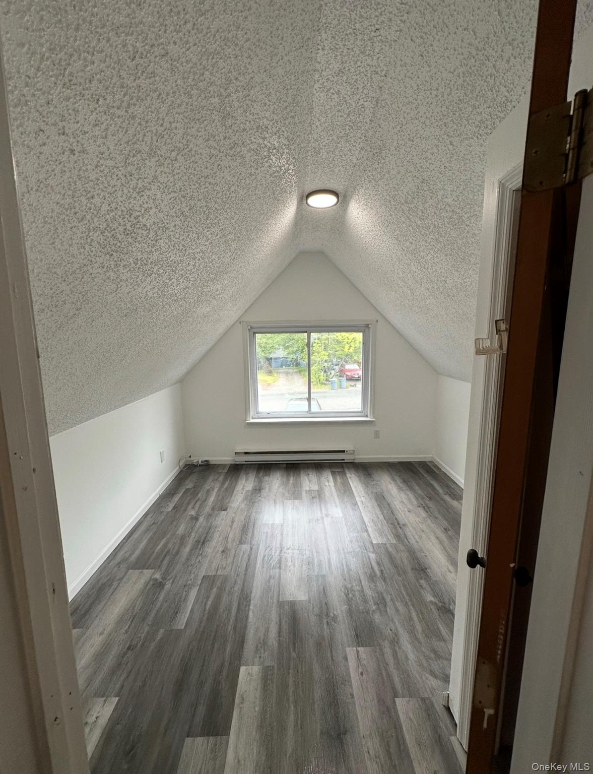 15 Fox Ridge Woodridge, NY 12789 - Photo 15 of 25 wooden floor in an empty room with a window