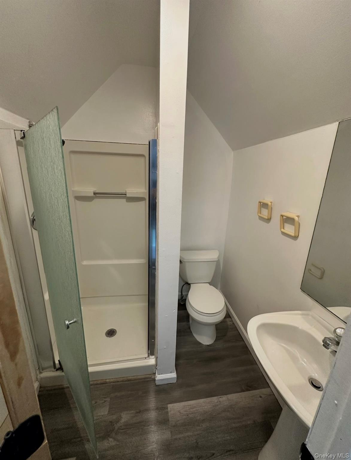 15 Fox Ridge Woodridge, NY 12789 - Photo 16 of 25 a white toilet sitting next to a bathroom sink