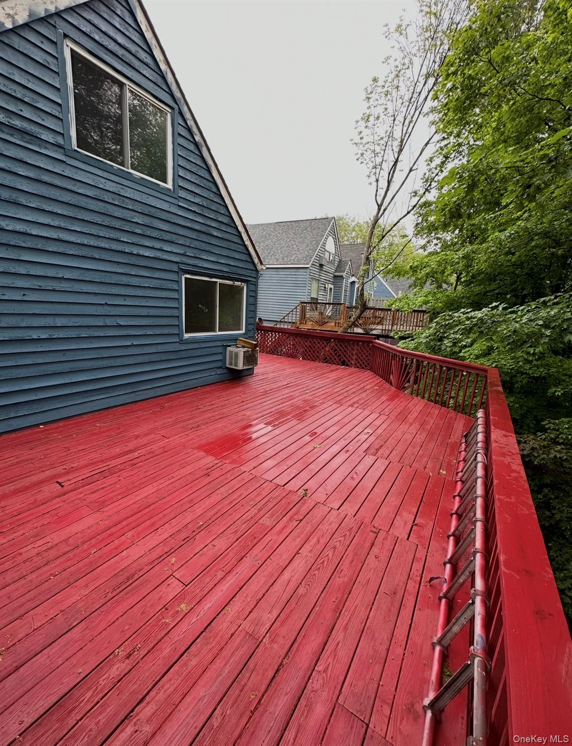 15 Fox Ridge Woodridge, NY 12789 - Photo 25 of 25 a backyard of a house with wooden floor and large trees