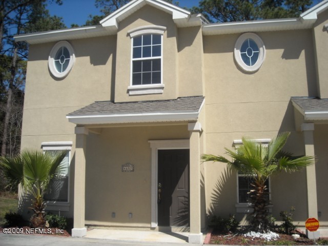 4657 Barnes Road South Jacksonville, FL 32207 - Photo 1 of 1 a front view of a house with garage