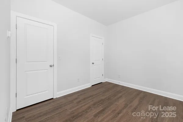 a view of small space with wooden floor