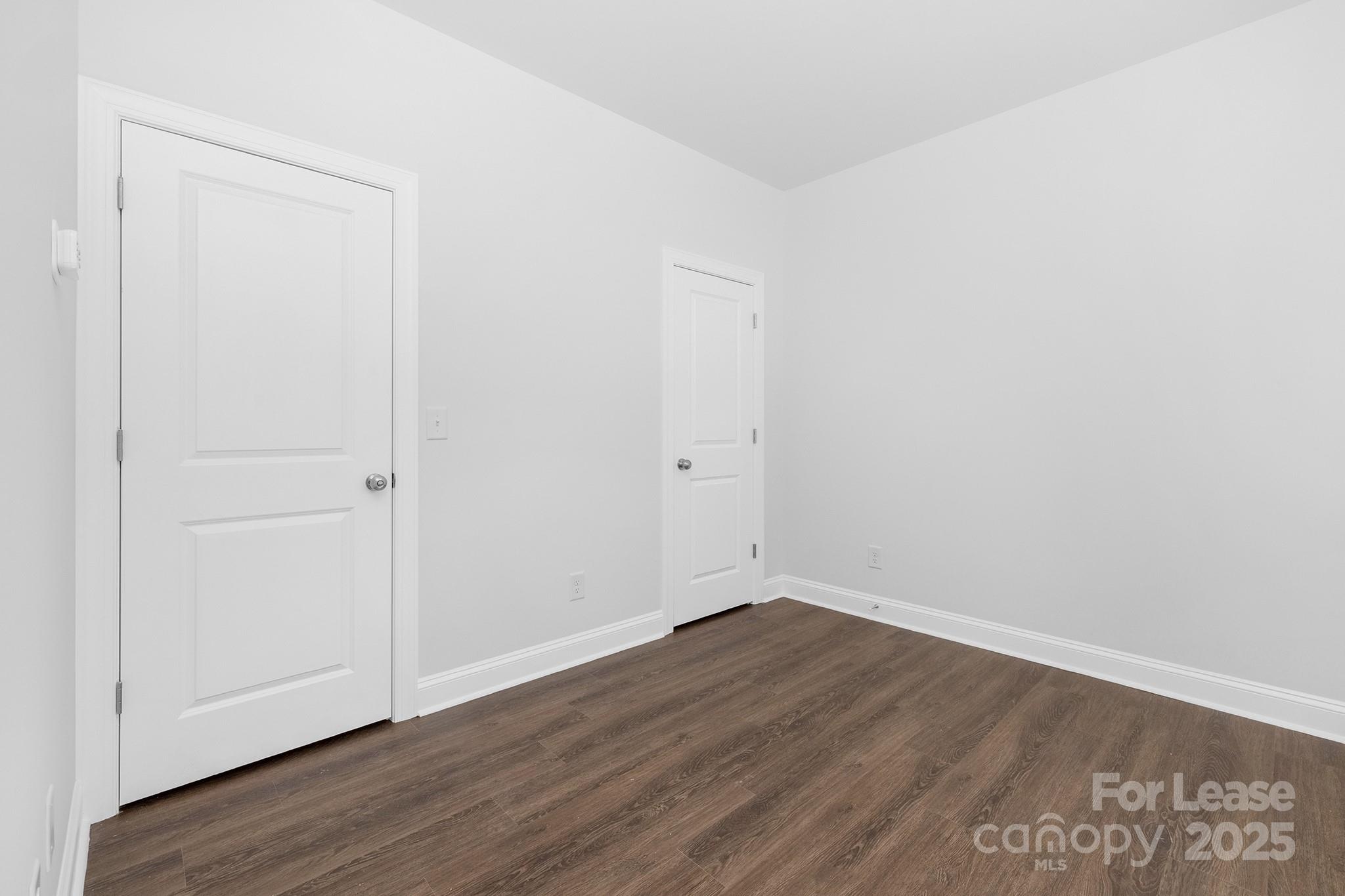 550 Beatties Ford Road Charlotte, NC 28216 - Photo 20 of 23 a view of small space with wooden floor