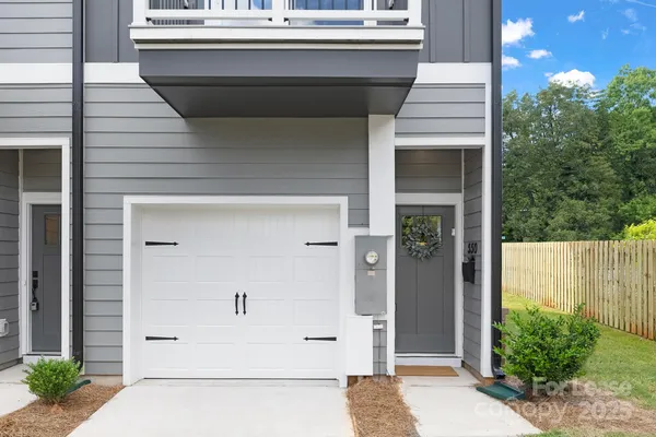 a view of entrance gate of a house