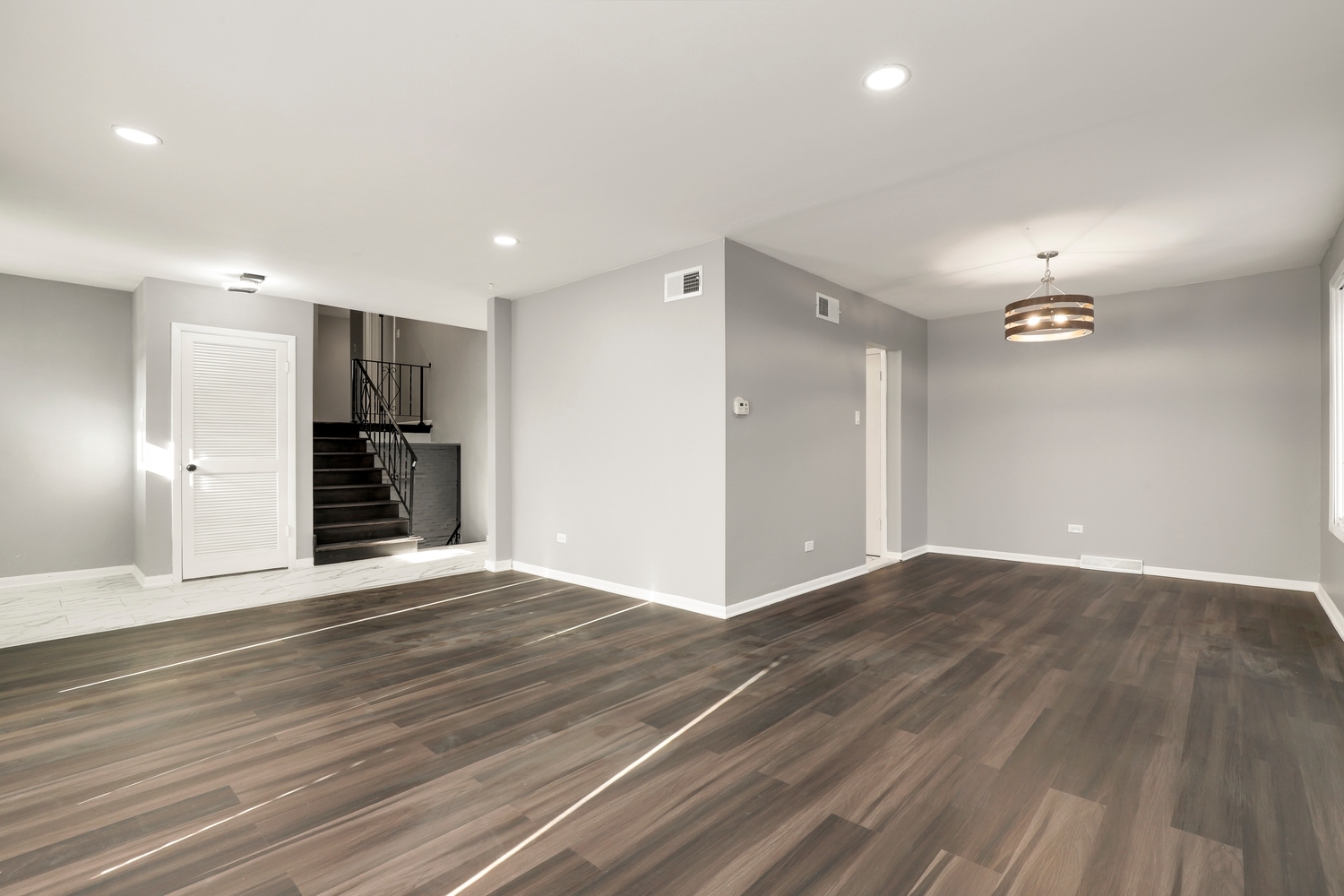 3518 South Manor Drive Lansing, IL 60438 - Photo 6 of 27 a view of an empty room with wooden floor