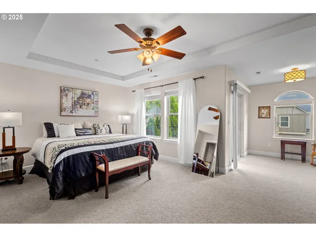 a bed room with a bed and a window