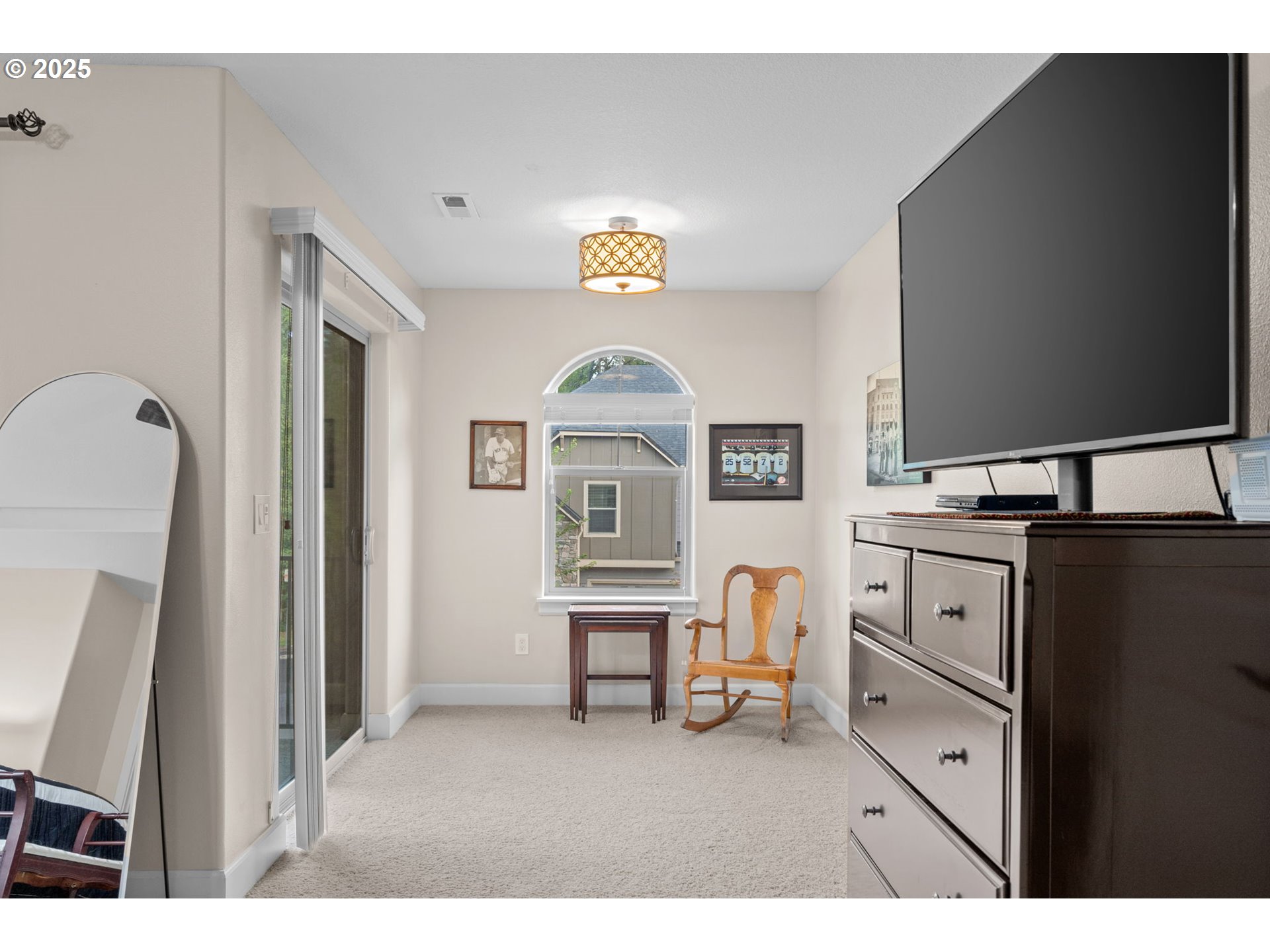 5717 Northwest 26th Avenue Camas, WA 98607 - Photo 20 of 35 a view of living room with furniture and a flat screen tv