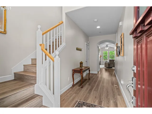 a view of entryway with wooden floor
