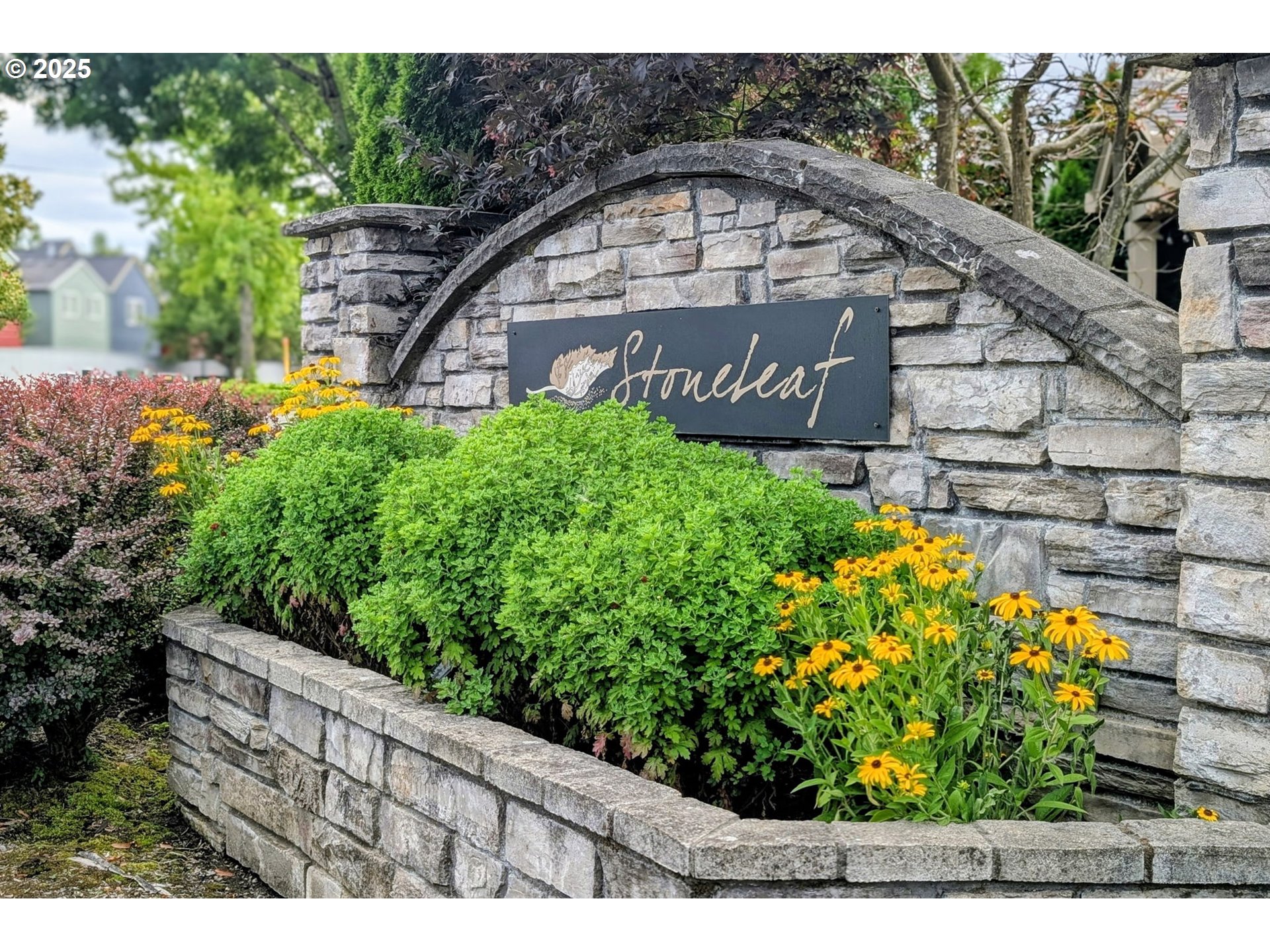 5717 Northwest 26th Avenue Camas, WA 98607 - Photo 35 of 35 a view of a garden with a bench