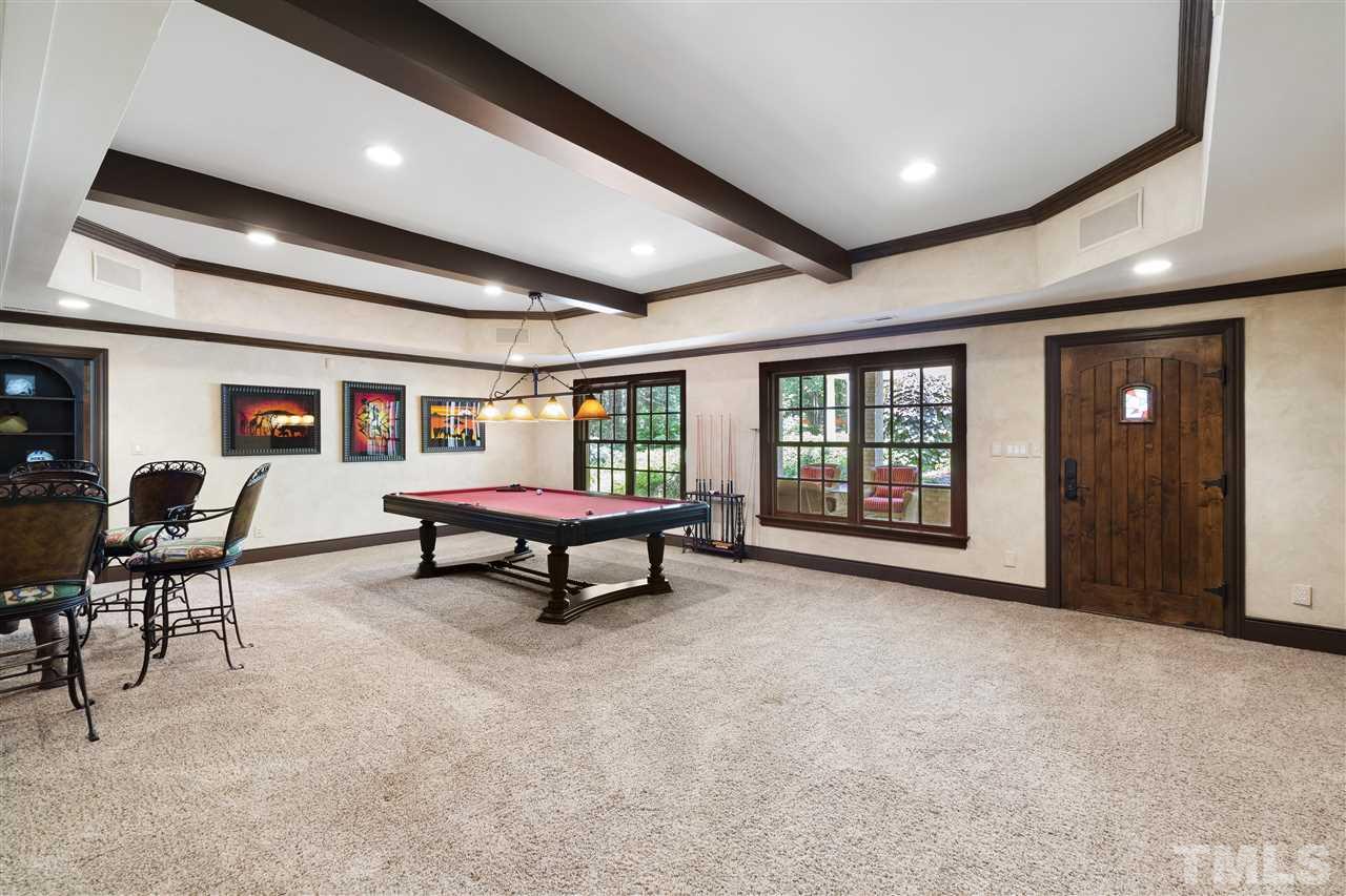 8423 Bournemouth Drive Raleigh, NC 27615 - Photo 22 of 30 a living room with furniture and a window