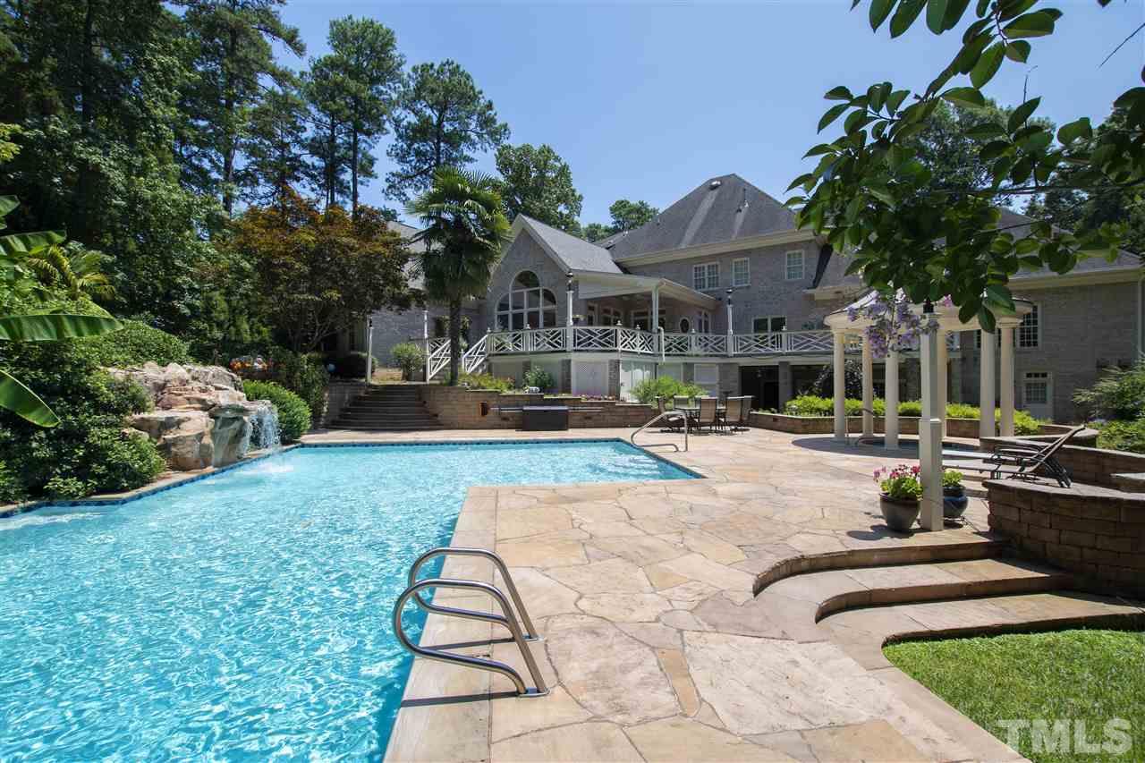 8423 Bournemouth Drive Raleigh, NC 27615 - Photo 26 of 30 a view of a house with backyard and patio